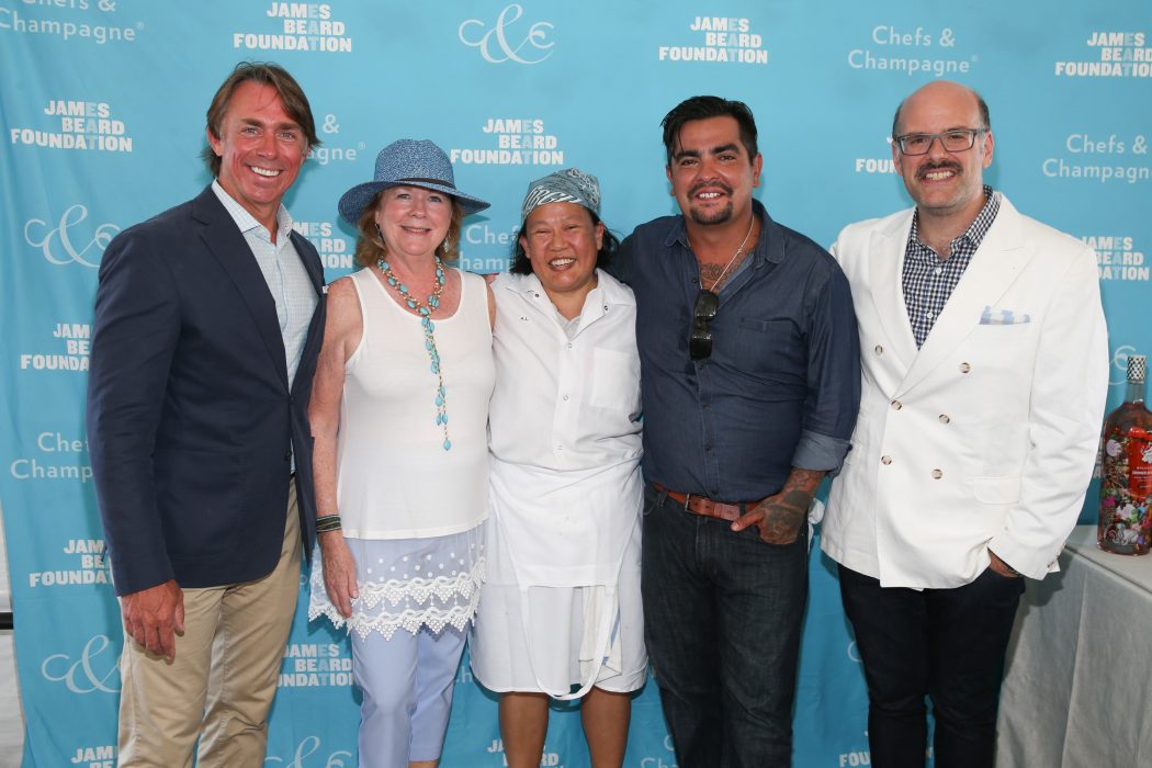 JBF President Susan Ungaro with honoree John Besh and Chef Anita Lo, Chef Aarón Sanchez, and JBF Executive Vice President Mitchell Davis at the 26th anniversary of the James Beard Foundation’s Chefs & Champagne® at Wölffer Estate Vineyard in the Hamptons on July 23, 2016. Photo by Mark Von Holden/Invision for James Beard Foundation/AP Images.
